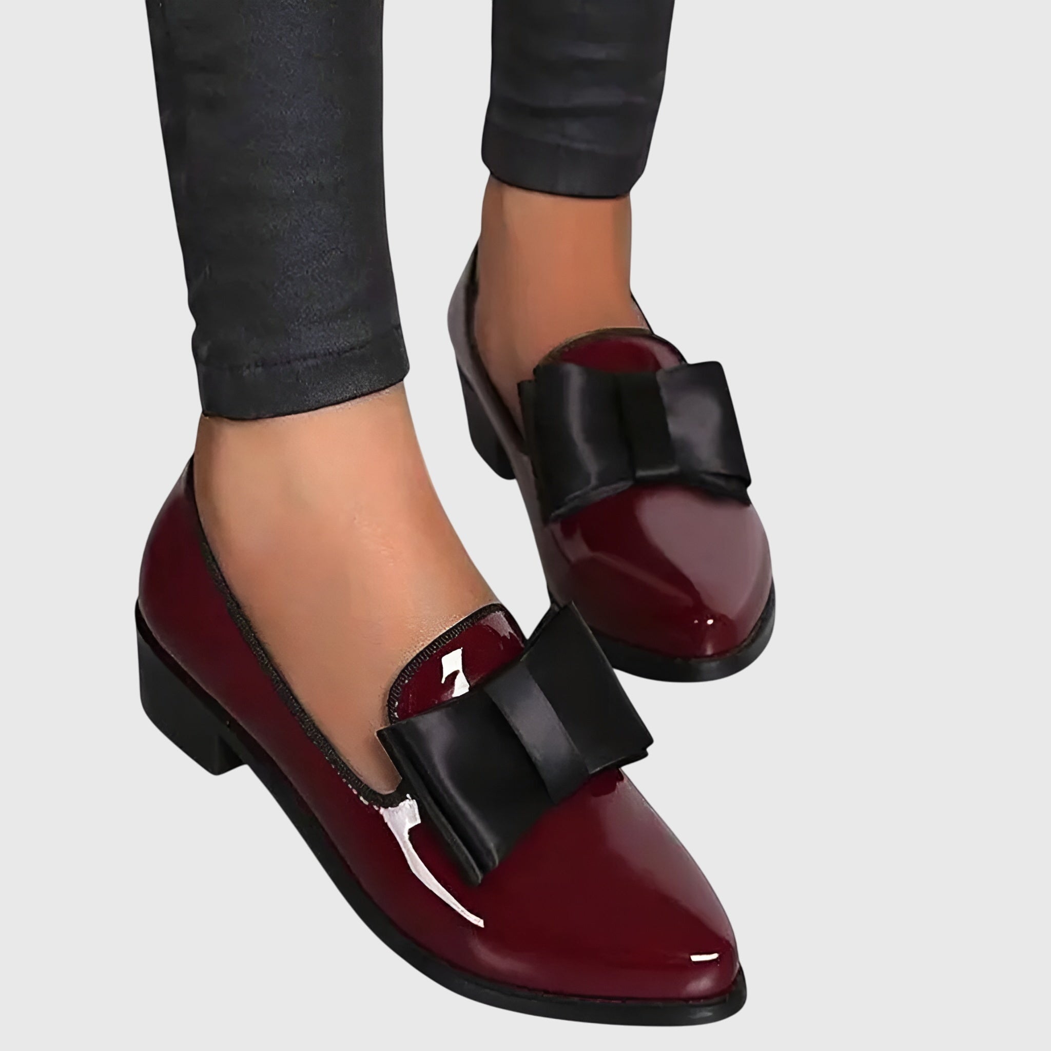 Red Anya orthopedic loafers by THE WHITMORE FAMILY with a sleek design and comfortable fit for supportive casual wear.