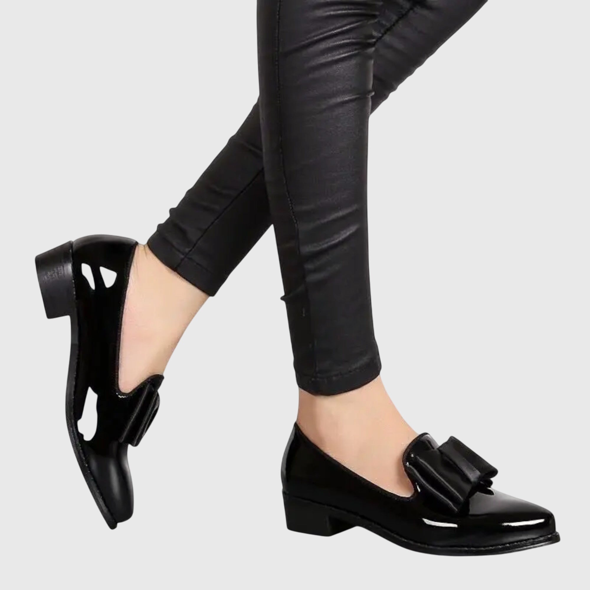 Red Anya orthopedic loafers by THE WHITMORE FAMILY featuring a sleek design and comfortable fit, shown on a plain white background.