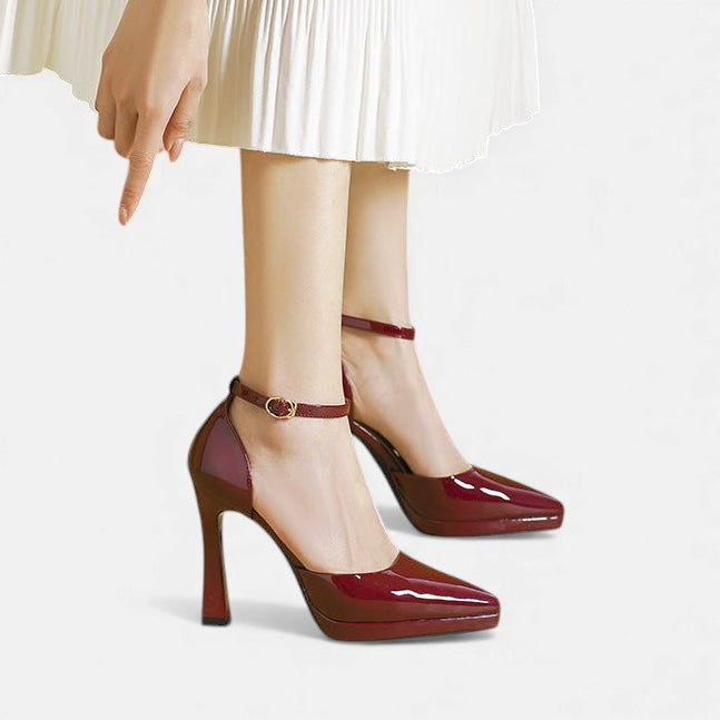 Red Evette leather heels from THE WHITMORE FAMILY featuring elegant pointed toes and sleek stiletto heels.