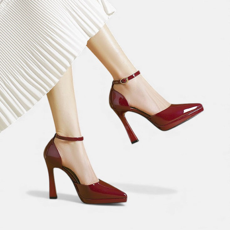Red leather Evette heels by THE WHITMORE FAMILY featuring sleek design and pointed toes.