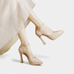 Red leather Evette heels by THE WHITMORE FAMILY, stylish women's shoes with elegant pointed toes and slender heels.