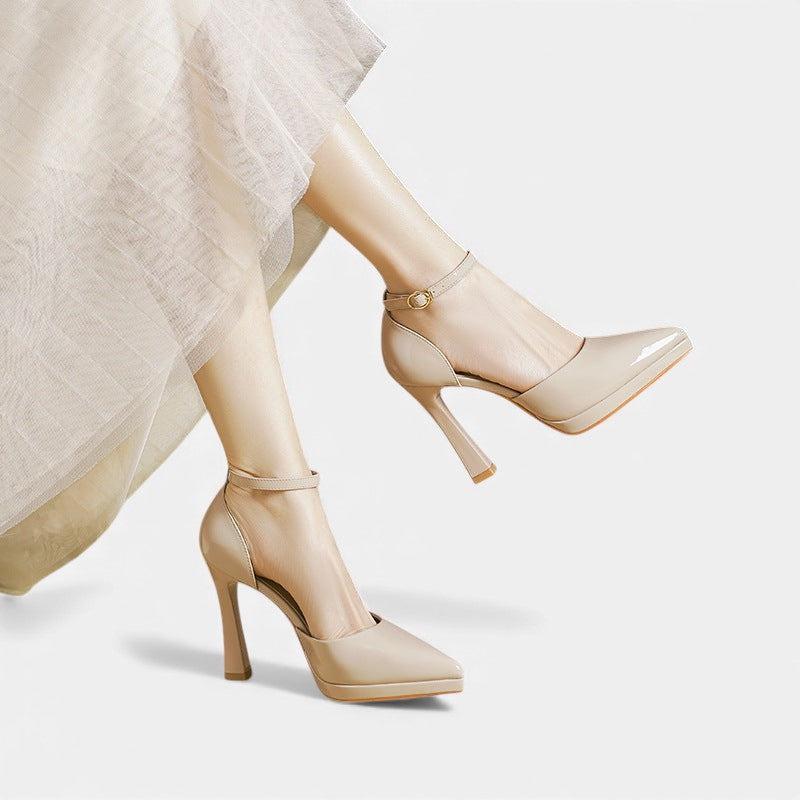 Red leather Evette heels by THE WHITMORE FAMILY, stylish women's shoes with elegant pointed toes and slender heels.