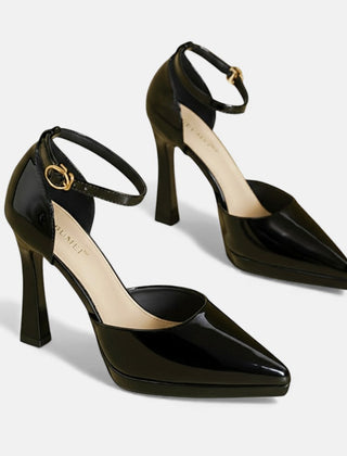 Red leather heels from THE WHITMORE FAMILY Evette collection, featuring sleek pointed toes and stylish stiletto heels.