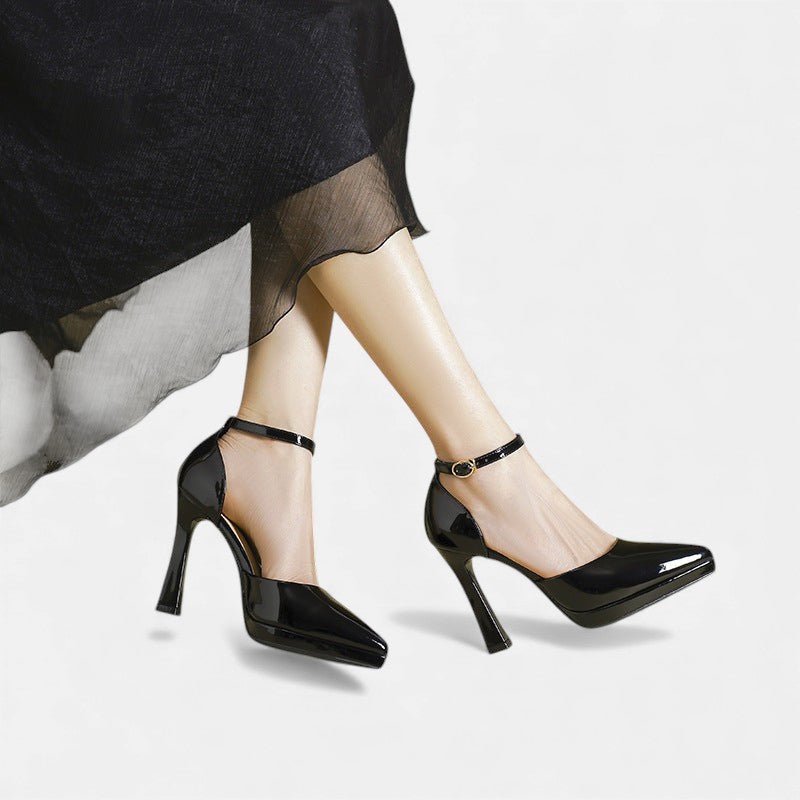 Red leather Evette heels by THE WHITMORE FAMILY displayed on a neutral background, showcasing the elegant design and pointed toe.