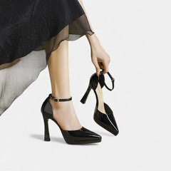 Red leather Evette heels by THE WHITMORE FAMILY featuring a sleek design and pointed toe for stylish elegance.
