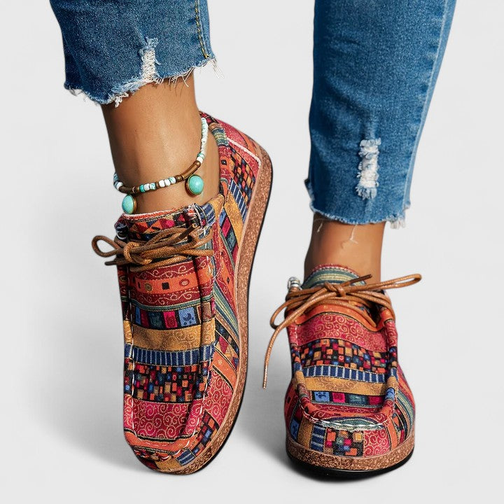 Red Nychelle orthopedic shoes by THE WHITMORE FAMILY featuring supportive design and comfortable fit.