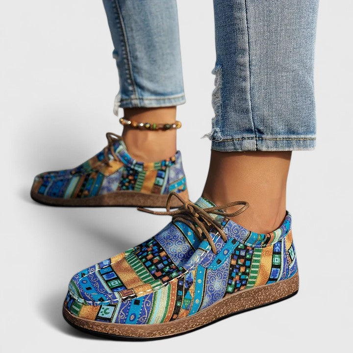 Red Nychelle orthopedic shoes by THE WHITMORE FAMILY featuring supportive design and comfortable fit.