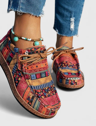 Red Nychelle orthopedic shoes by THE WHITMORE FAMILY featuring supportive design and comfortable soles.