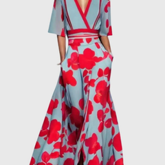 Elegant spring dress by THE WHITMORE FAMILY, featuring a red Candice dress with a flattering fit and floral details.
