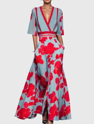 Elegant spring dress by THE WHITMORE FAMILY, featuring a red Candice dress with a flattering fit and floral details.