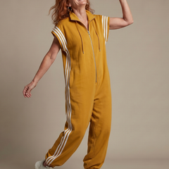 Red Lark zip-front stripe panel jumpsuit by THE WHITMORE FAMILY, featuring a stylish design and comfortable fit.