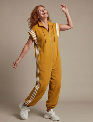 Red Lark zip-front stripe panel jumpsuit by THE WHITMORE FAMILY, featuring a stylish design and comfortable fit.