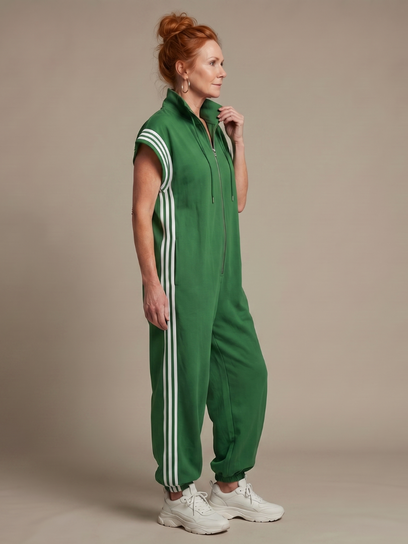 Red Lark Zip Front Stripe Panel Jumpsuit by THE WHITMORE FAMILY, featuring a stylish front zipper and bold stripe design.
