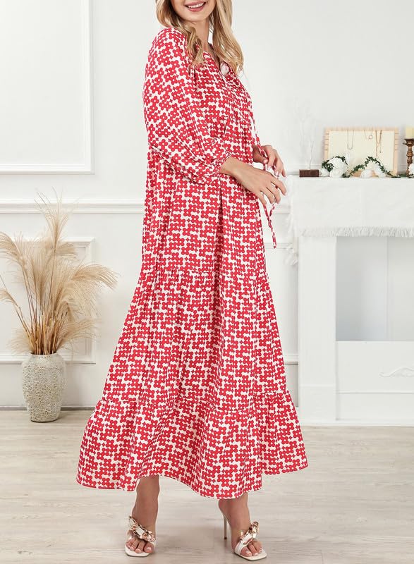 Nina floral boho maxi dress by THE WHITMORE FAMILY featuring vibrant red floral pattern and flowing silhouette.