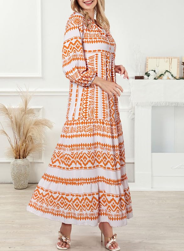 Nina floral boho maxi dress by THE WHITMORE FAMILY, featuring vibrant floral patterns and flowing fabric, shown on a model.