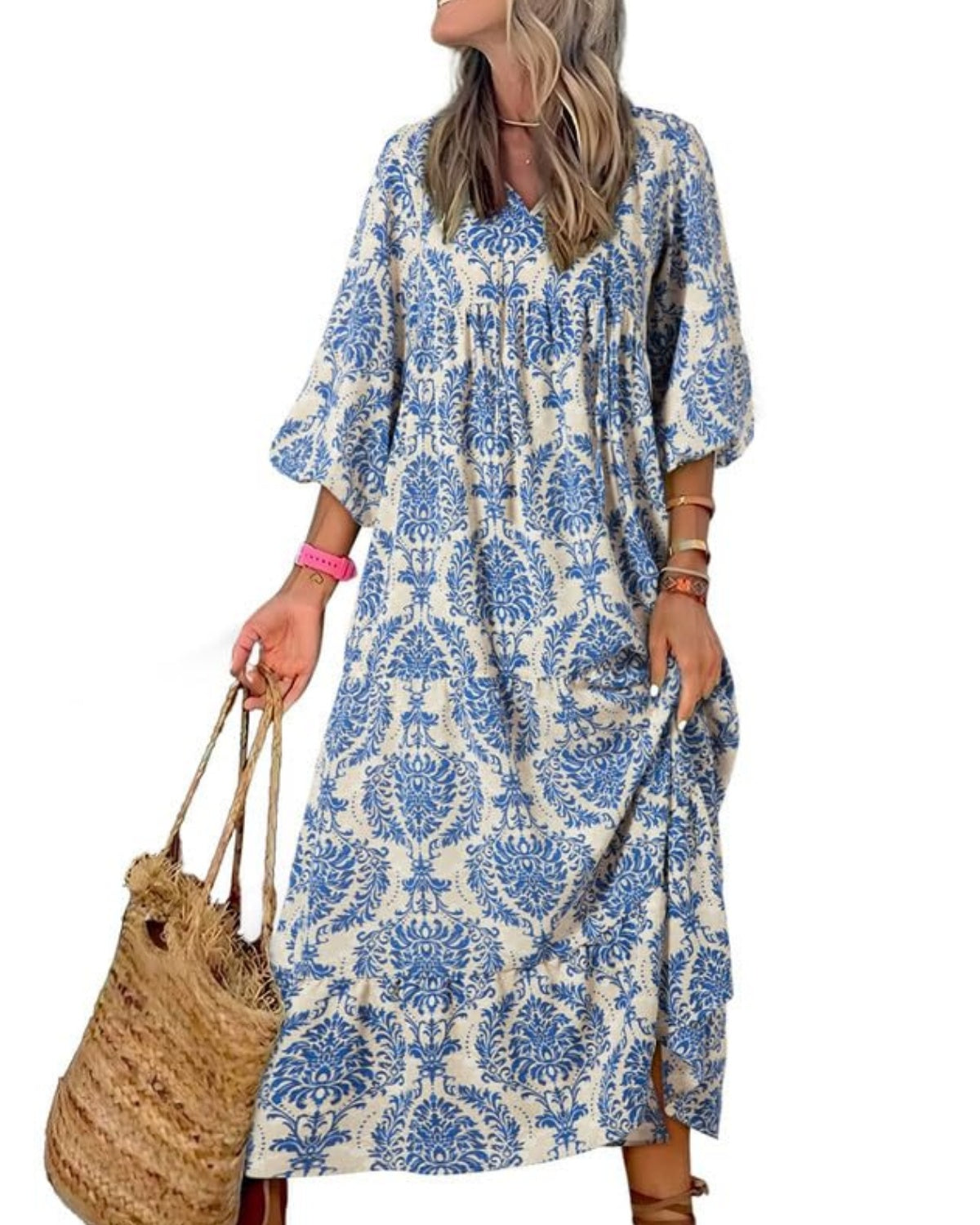 Nina floral boho maxi dress by THE WHITMORE FAMILY, featuring a vibrant floral pattern, flowing fabric, and bohemian style.