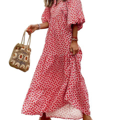 Nina floral boho maxi dress by THE WHITMORE FAMILY, featuring a flowing design with vibrant floral print and bohemian style.