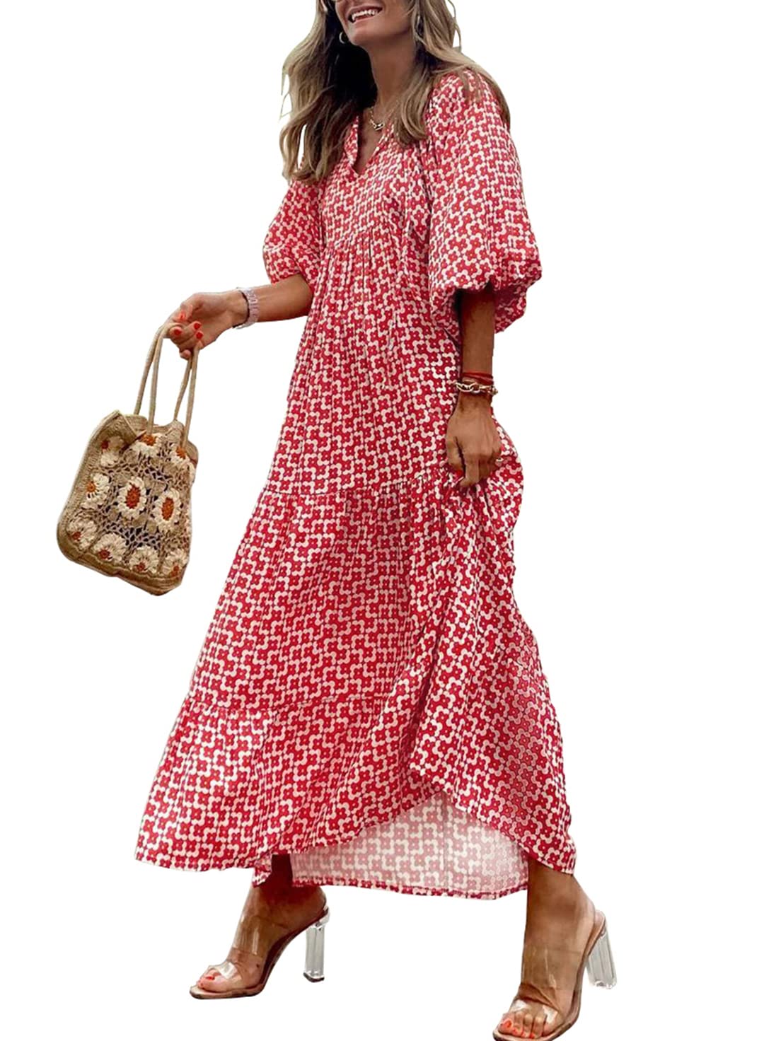 Nina floral boho maxi dress by THE WHITMORE FAMILY, featuring a flowing design with vibrant floral print and bohemian style.