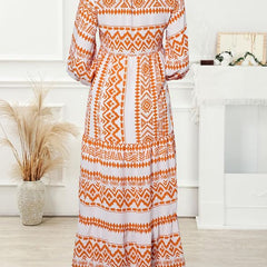 Nina floral boho maxi dress by THE WHITMORE FAMILY, featuring a vibrant red and floral pattern, flowing fabric, and bohemian style.
