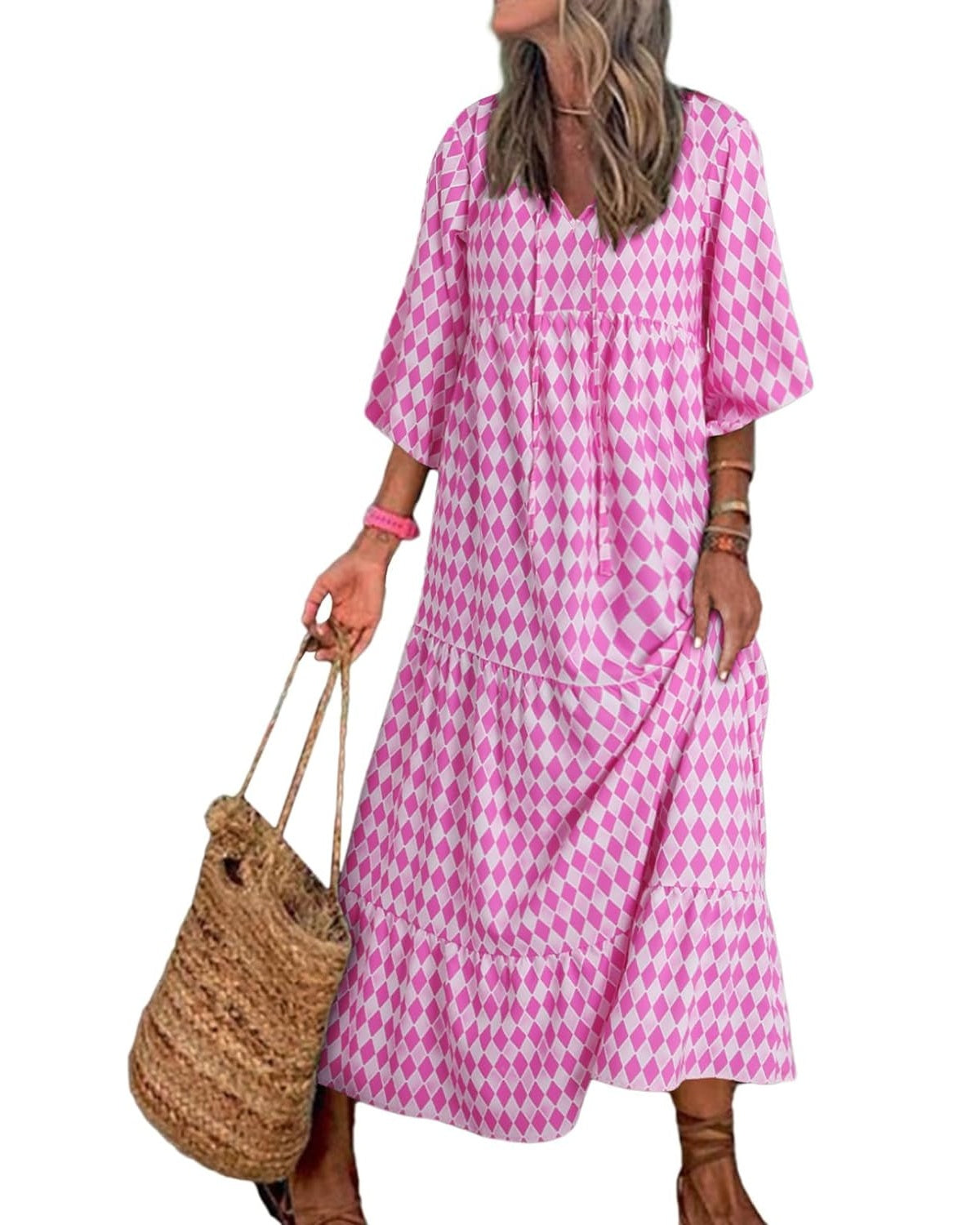 Nina floral boho maxi dress by THE WHITMORE FAMILY, featuring a vibrant red floral pattern and flowing silhouette.