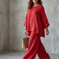Red oversized tunic and wide-leg pant set by THE WHITMORE FAMILY, featuring relaxed fit and comfortable style.