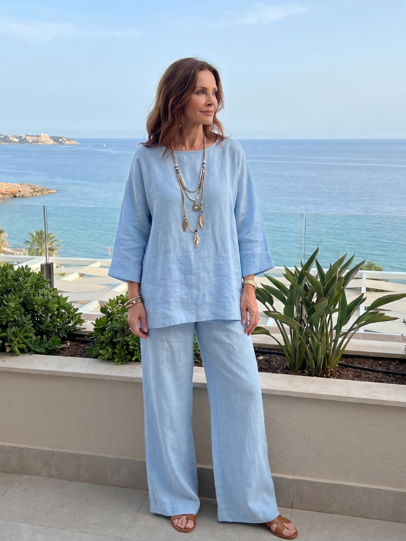 THE WHITMORE FAMILY Prue oversized tunic and wide-leg pant set in vibrant red, styled for a casual, relaxed look.