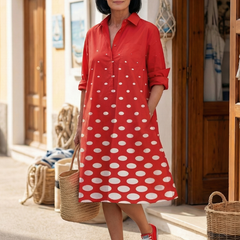Red Wrenley Bright Day Dot Dress by THE WHITMORE FAMILY featuring cheerful white polka dots and a comfortable, stylish fit.