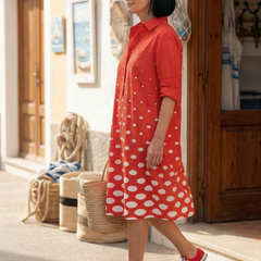 Red Wrenley Bright Day Dot Dress by THE WHITMORE FAMILY, showcasing a playful dot pattern and flowy fabric for girls.
