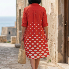 Red Wrenley Bright Day Dot Dress by THE WHITMORE FAMILY, featuring a playful polka dot pattern and sleeveless design for girls.