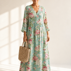 Anne printed summer dress by THE WHITMORE FAMILY, featuring a colorful floral pattern and lightweight fabric.