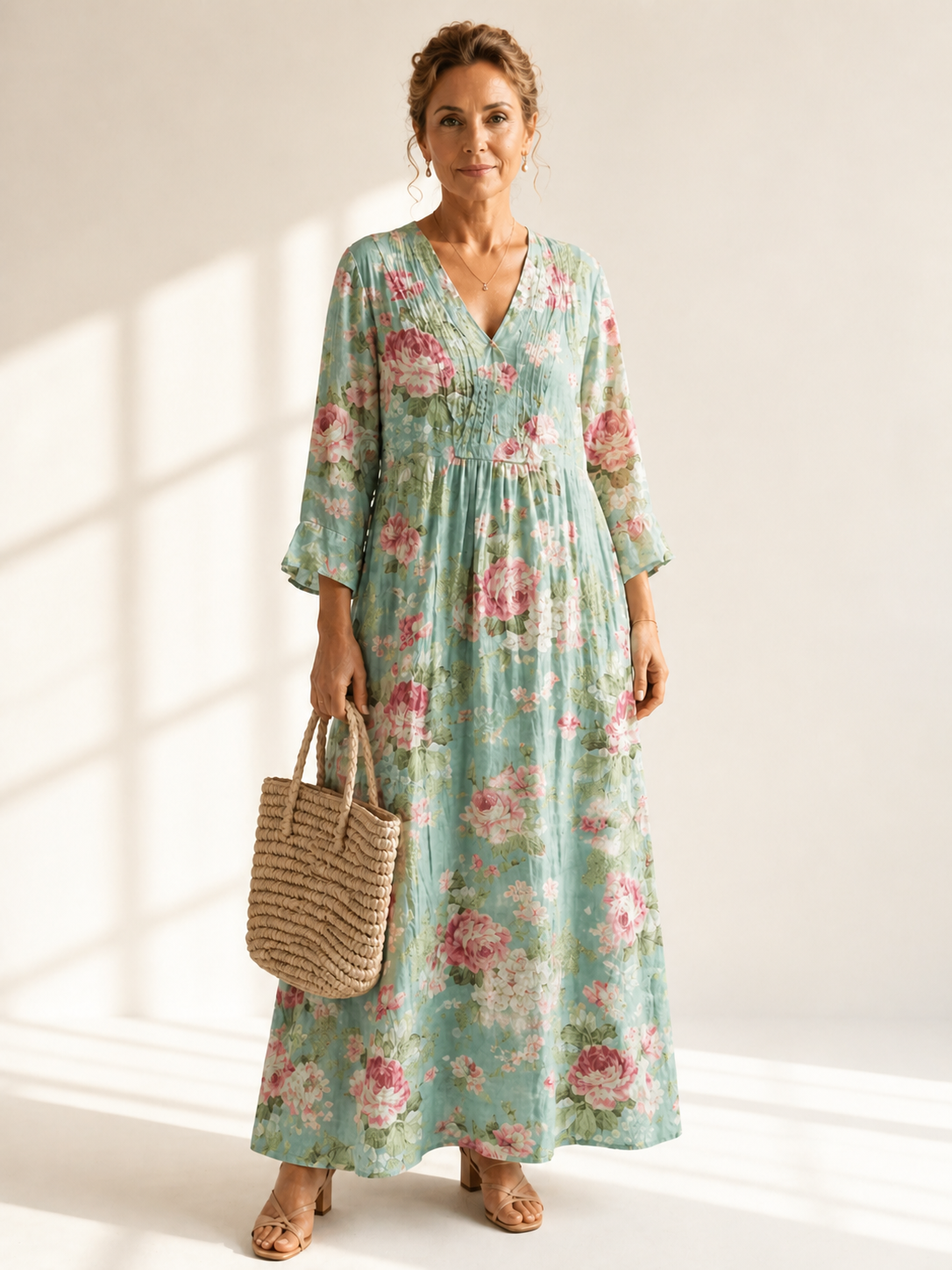 Anne printed summer dress by THE WHITMORE FAMILY, featuring a colorful floral pattern and lightweight fabric.