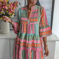 Chic V-neck hemp summer dress by THE WHITMORE FAMILY featuring a relaxed fit and lightweight fabric for warm weather.