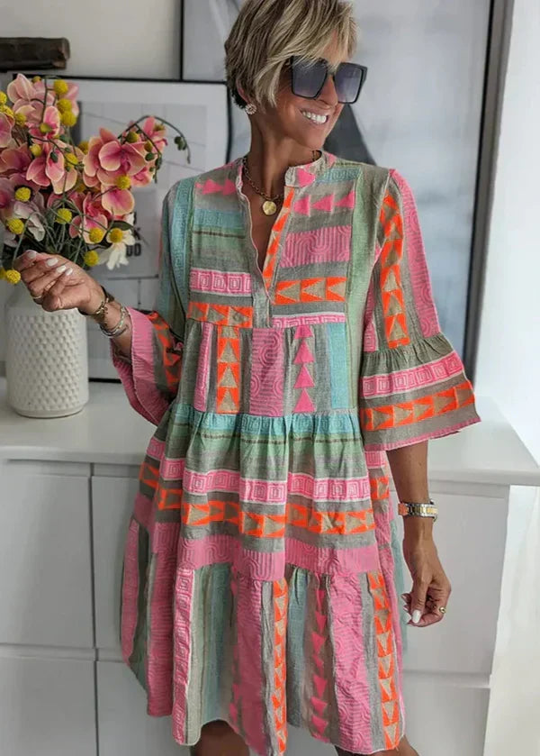 Chic V-neck hemp summer dress by THE WHITMORE FAMILY featuring a relaxed fit and lightweight fabric for warm weather.
