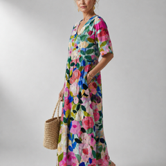 Vintage flower dress by THE WHITMORE FAMILY featuring a floral pattern and a classic silhouette.