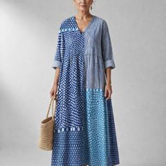 Women's Lucille dress by THE WHITMORE FAMILY, vibrating and comfortable, shown in a stylish, fitted design perfect for casual wear.