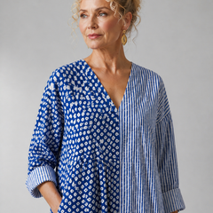 Lucille women's vibrating and comfortable dress by THE WHITMORE FAMILY, shown in a stylish, relaxed fit with vibrant fabric details.