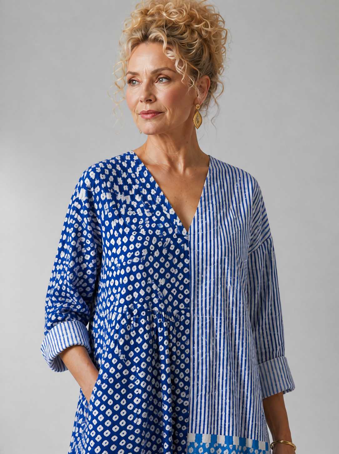 Lucille women's vibrating and comfortable dress by THE WHITMORE FAMILY, shown in a stylish, relaxed fit with vibrant fabric details.