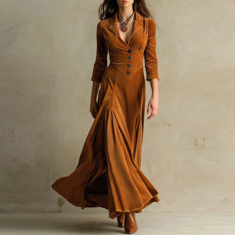Flowing velvet maxi dress by THE WHITMORE FAMILY, featuring a elegant design and rich fabric in a full-length style.