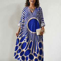 Women's vibrant Rosemary dress by THE WHITMORE FAMILY, featuring a comfortable fit and colorful floral pattern.