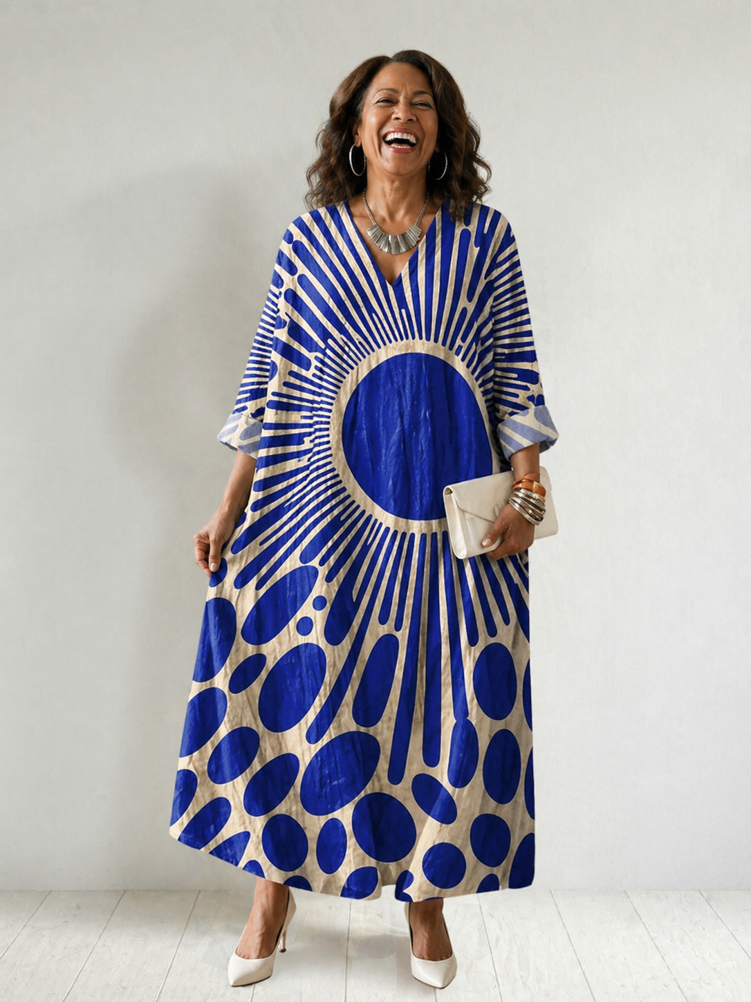 Women's vibrant Rosemary dress by THE WHITMORE FAMILY, featuring a comfortable fit and colorful floral pattern.