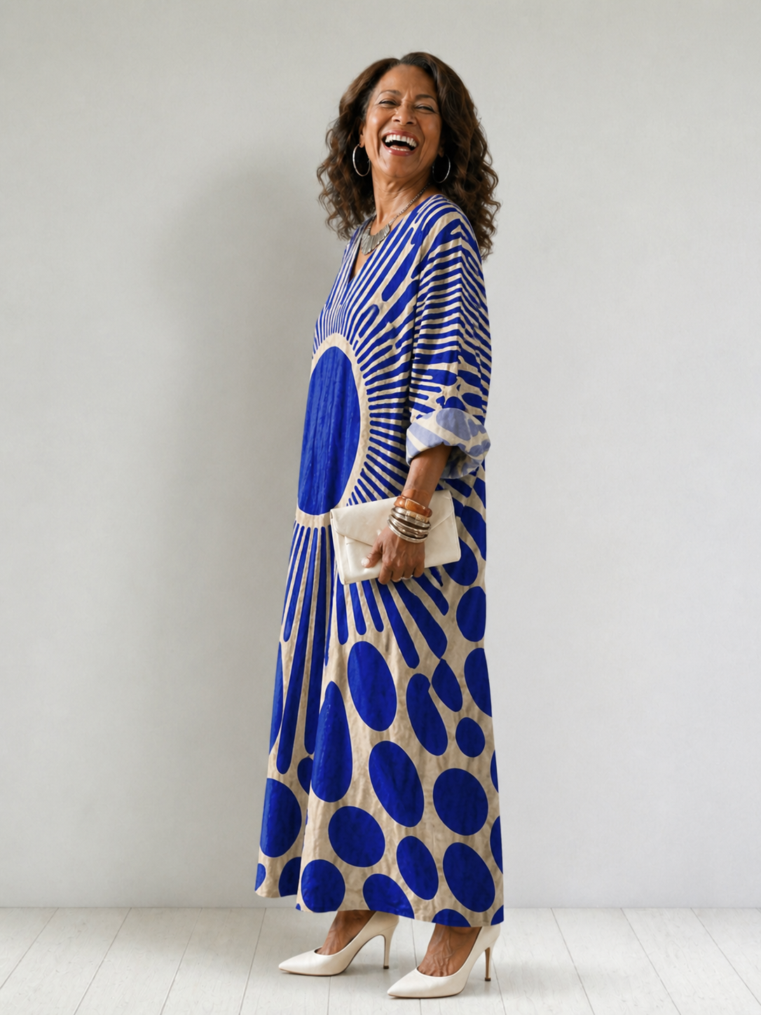 Women's Rosemary dress by THE WHITMORE FAMILY, vibrant and comfortable floral dress with a relaxed fit and colorful pattern.