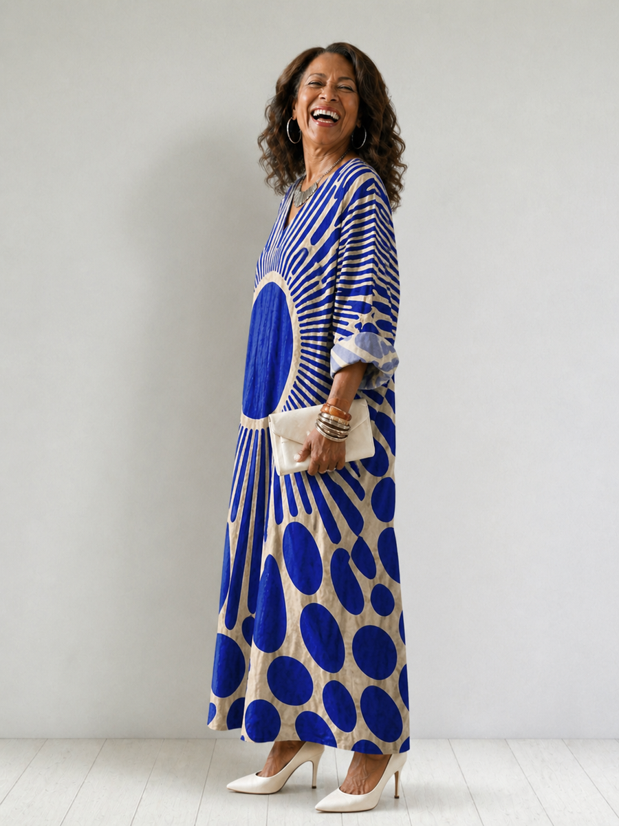 Women's Rosemary dress by THE WHITMORE FAMILY, vibrant and comfortable floral dress with a relaxed fit and colorful pattern.