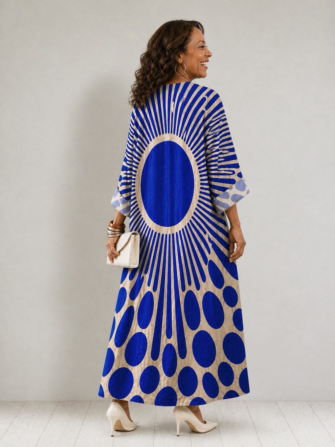 Women's Rosemary dress by THE WHITMORE FAMILY featuring vibrant colors and a comfortable, stylish fit.