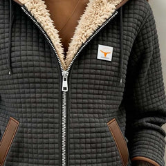 Silvana™ Sherpa-lined quilted zip-up hooded jacket by THE WHITMORE FAMILY, featuring a cozy sherpa lining and quilted design.
