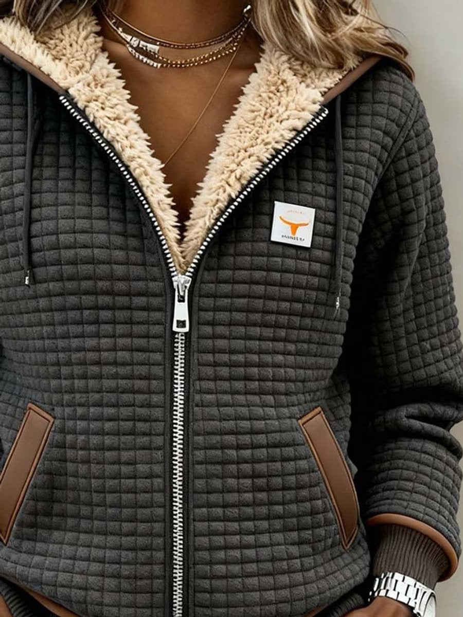 Silvana™ Sherpa-lined quilted zip-up hooded jacket by THE WHITMORE FAMILY, featuring a cozy sherpa lining and quilted design.