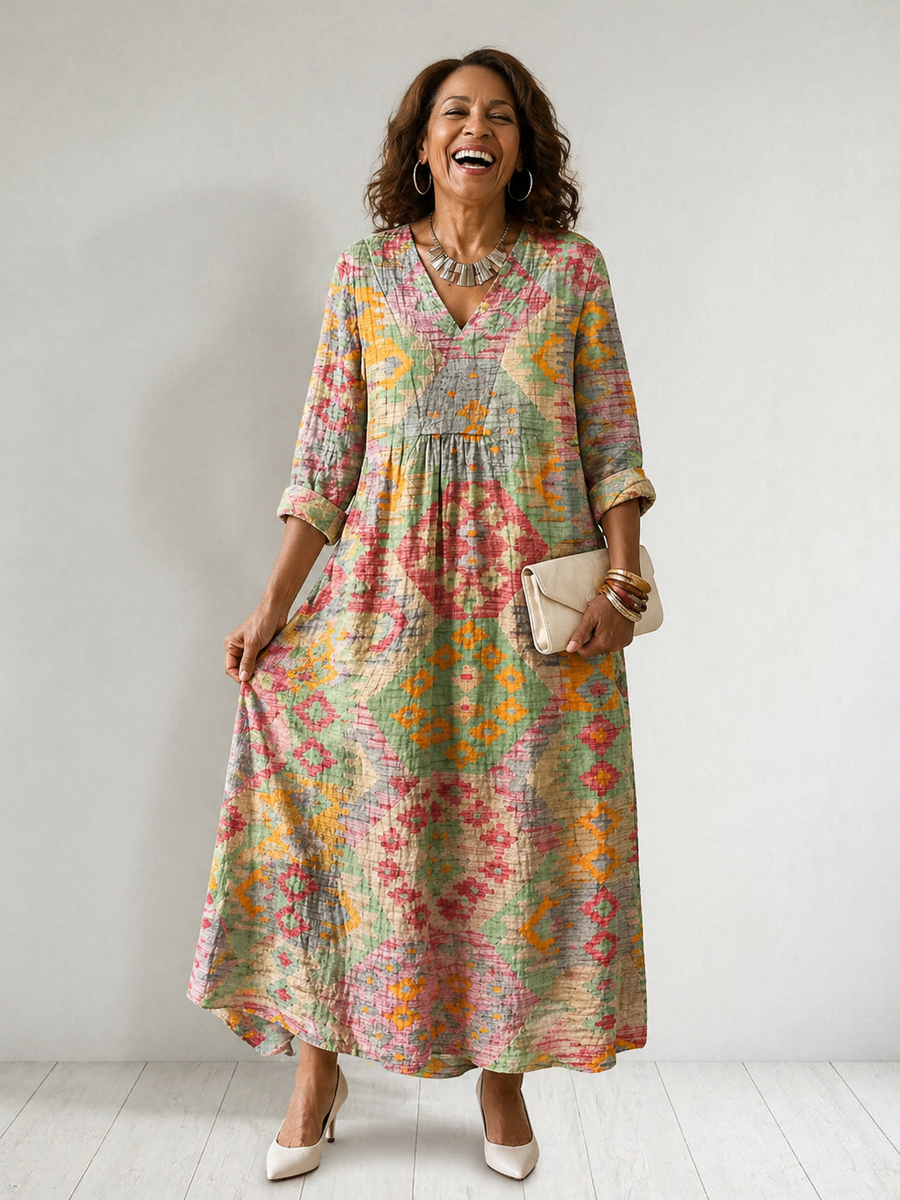 Virginia Printed Summer Breeze Dress by THE WHITMORE FAMILY, lightweight fabric with floral pattern and flowing silhouette.