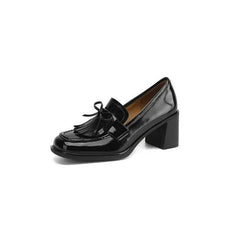Black Dorothy loafer pumps by THE WHITMORE FAMILY, stylish sandal with a sleek design and comfortable fit.