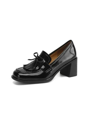 Black Dorothy loafer pumps by THE WHITMORE FAMILY, stylish sandal with a sleek design and comfortable fit.