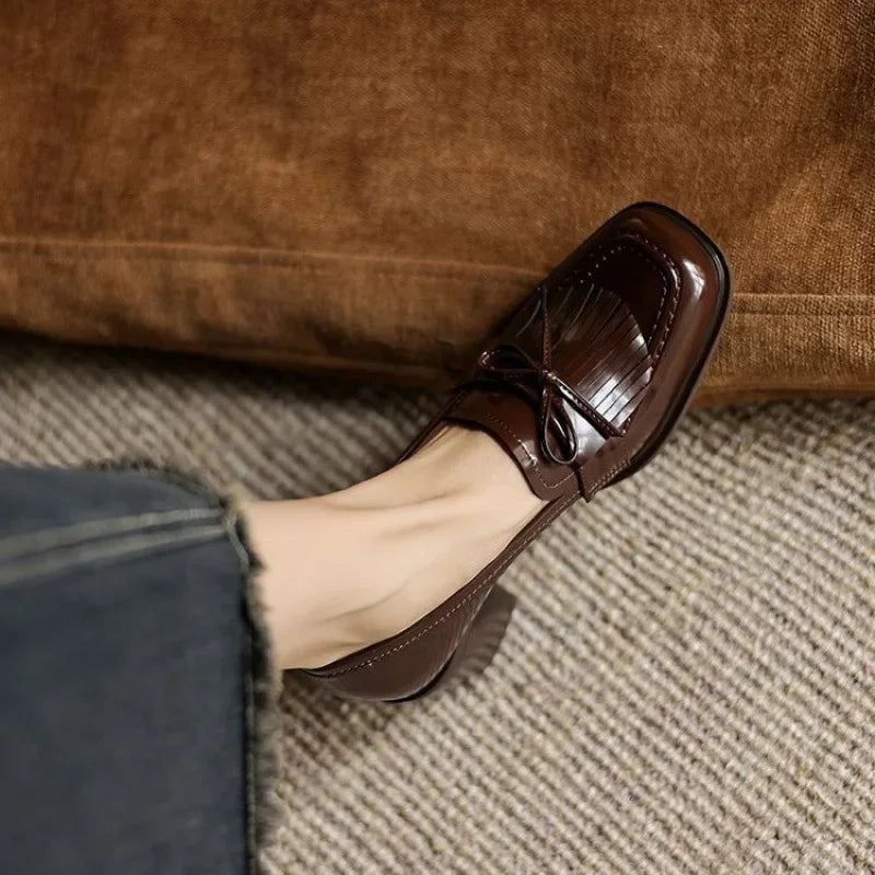 Black Dorothy loafer pumps by THE WHITMORE FAMILY, stylish sandal with a classic loafer design and comfortable slip-on fit.
