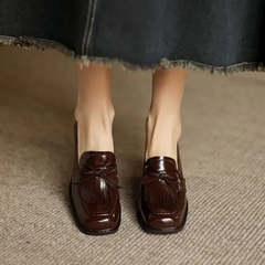 Black Dorothy loafer pumps by THE WHITMORE FAMILY, stylish slip-on sandal with a sleek design and comfortable fit.